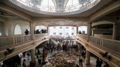 Death toll in Pakistan mosque suicide bombing soars
