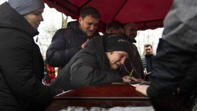 Funerals begin for dozens of people killed in an attack on a Dnipro apartment complex