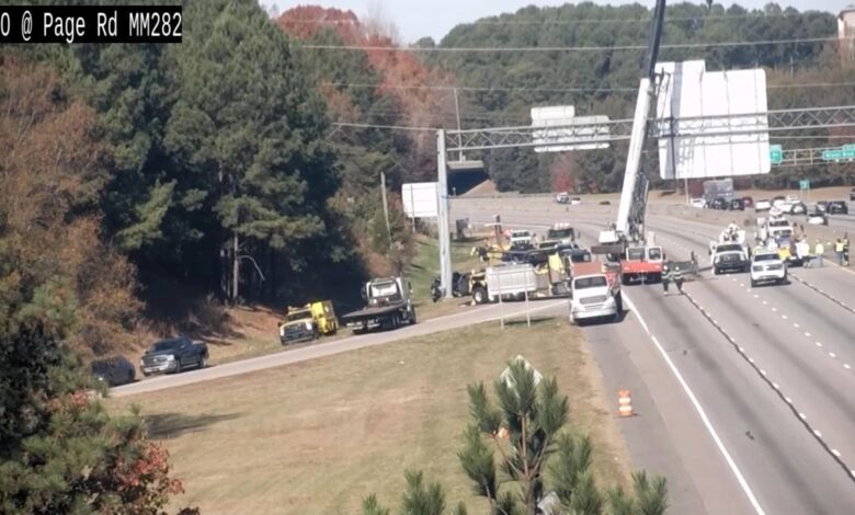 Truck smashes into concrete beam for overhead highway sign, closing all lanes of I-40 eastbound
