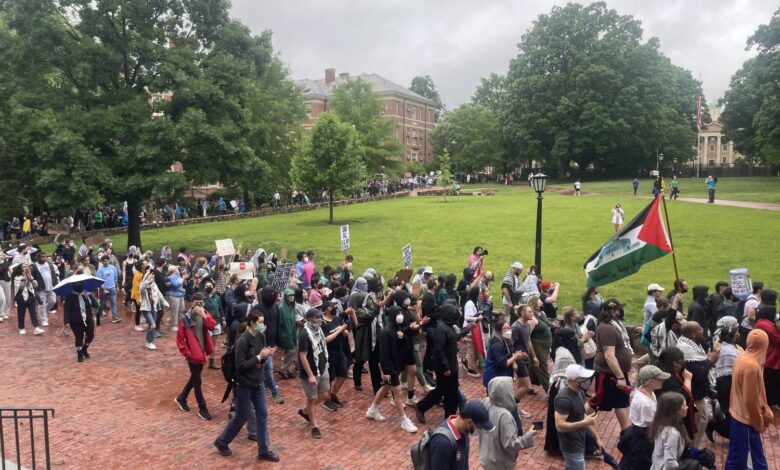 Pro-Palestinian protesters marching through UNC after blocking Franklin Street