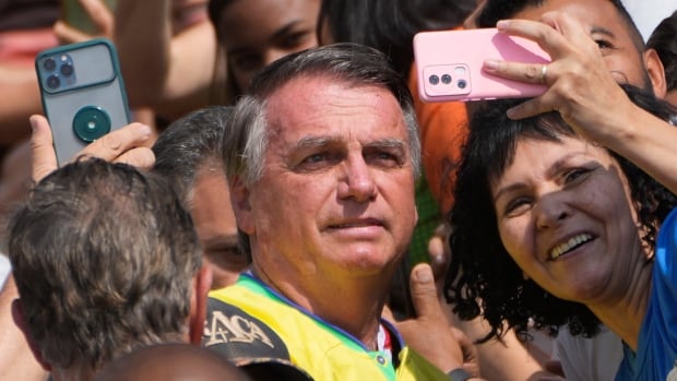 Former Brazilian leader Jair Bolsonaro accused of plotting to overturn 2022 election