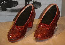 Slippers worn by American actress Judy Garland in 1939 film The Wizard of Oz break sales record, sold for US$28 million at auction