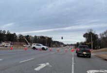 Both directions of US 70 blocked in Garner, crash brings down traffic signal at Timber Drive