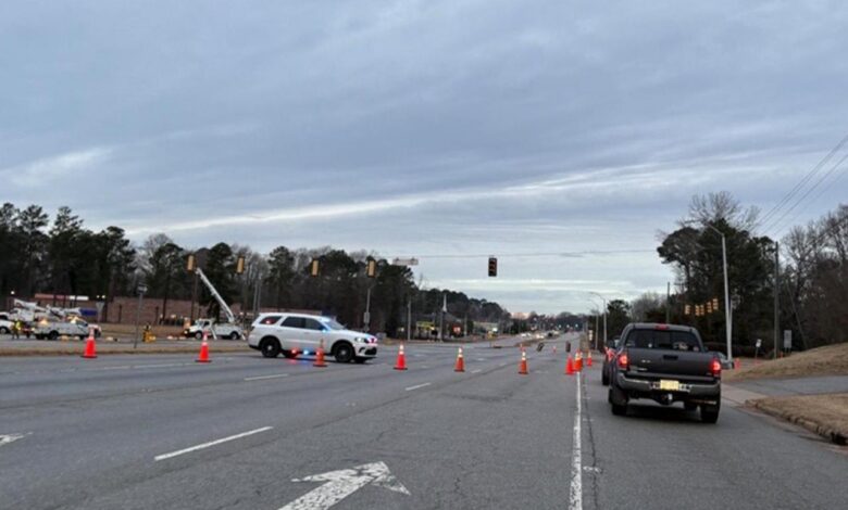 Both directions of US 70 blocked in Garner, crash brings down traffic signal at Timber Drive